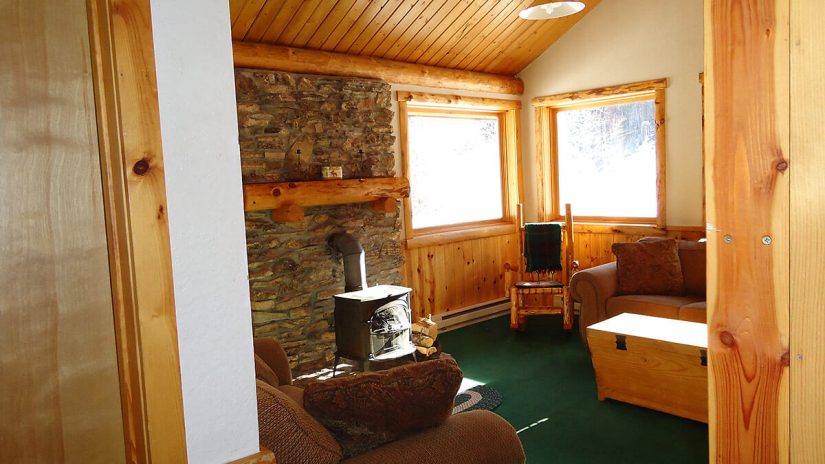 Cabin 3 woodstove and living area